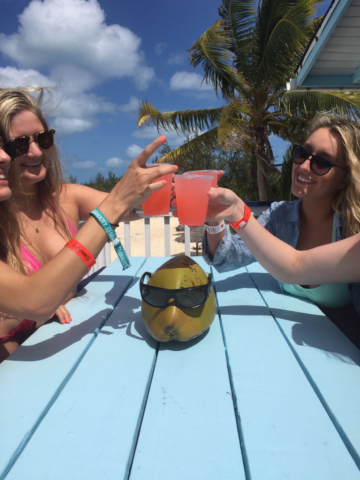 girls drinking on the beach